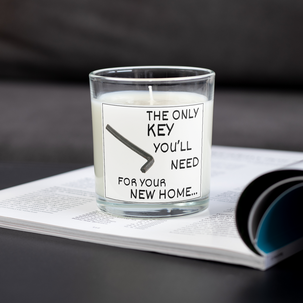 The Only Key You'll Need new home candle on an open magazine