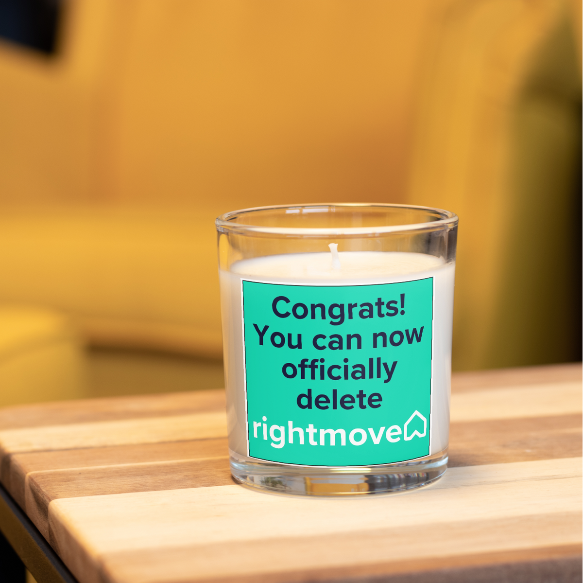 Funny delete Rightmove new home candle in a warm home setting