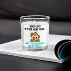 Funny housewarming candle saying hope the neighbours aren't twats on an open magazine