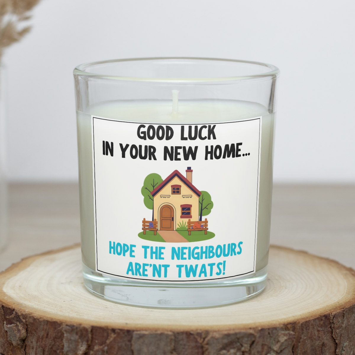 Funny new home candle saying Good luck in your new home, hope the neighbours aren't twats