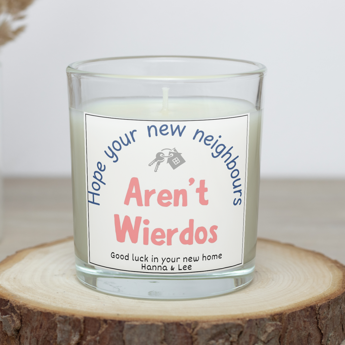 Funny personalised new home candle saying Hope your new neighbours aren't weirdos