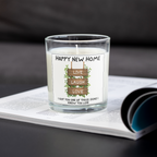 Happy New Home Live Laugh Love candle on an open magazine