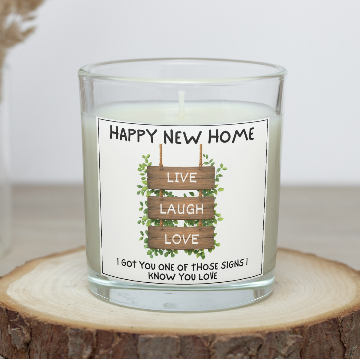 Happy New Home candle with Live Laugh Love wooden sign design