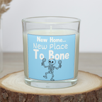 Funny new home candle with New Place To Bone skeleton design