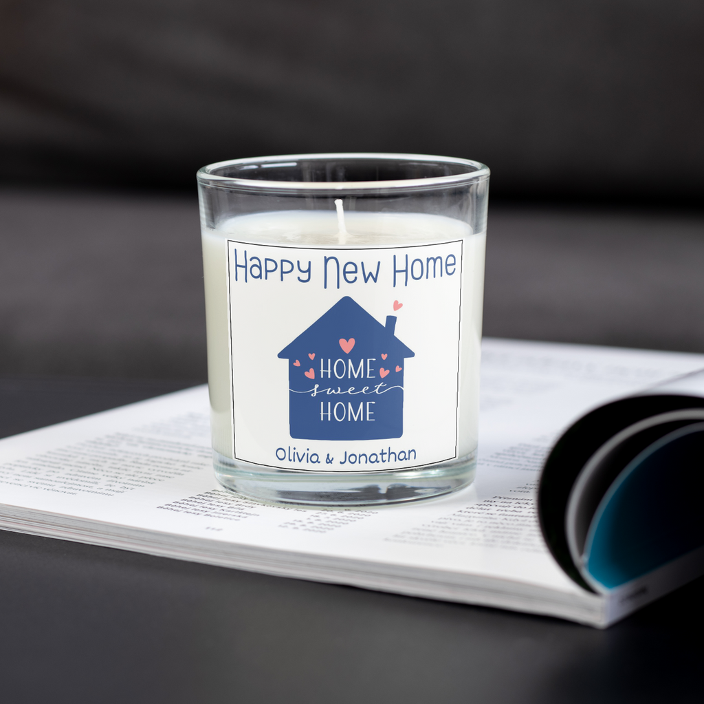 Happy New Home personalised candle with Home Sweet Home design on an open magazine