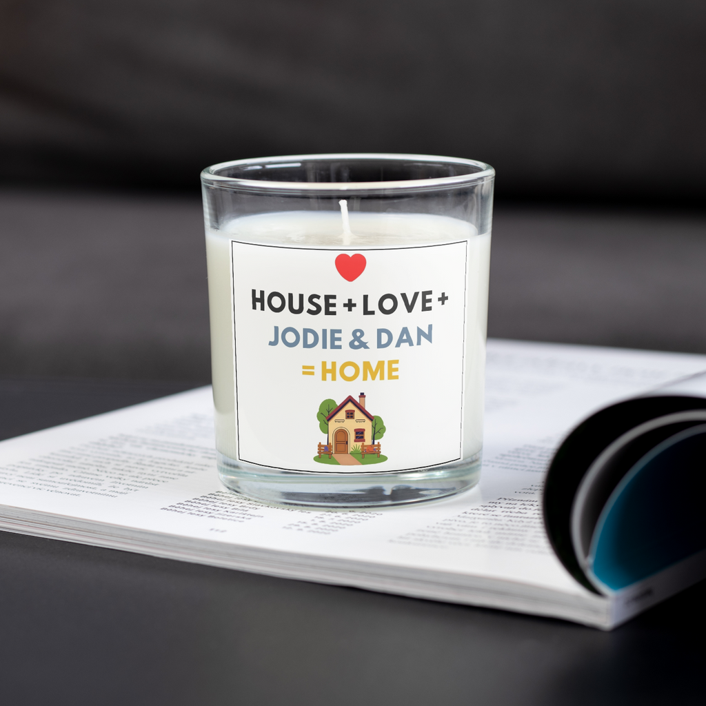 House + Love + names personalised new home candle on an open magazine