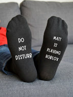 Playing Roblox Socks – Personalised Gamer Gift – sofa lifestyle view