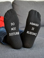 Do Not Disturb Reading Socks – Personalised Book Lover Gift – sofa lifestyle view