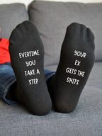Every Time You Take a Step Socks – Rude Ex Joke Gift – sofa lifestyle view