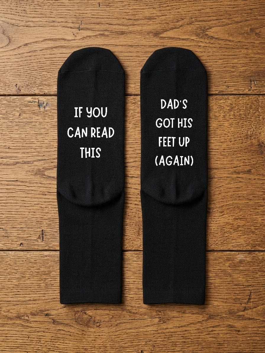 Dad’s Got His Feet Up Again Socks – Funny Gift for Dad – flat lay