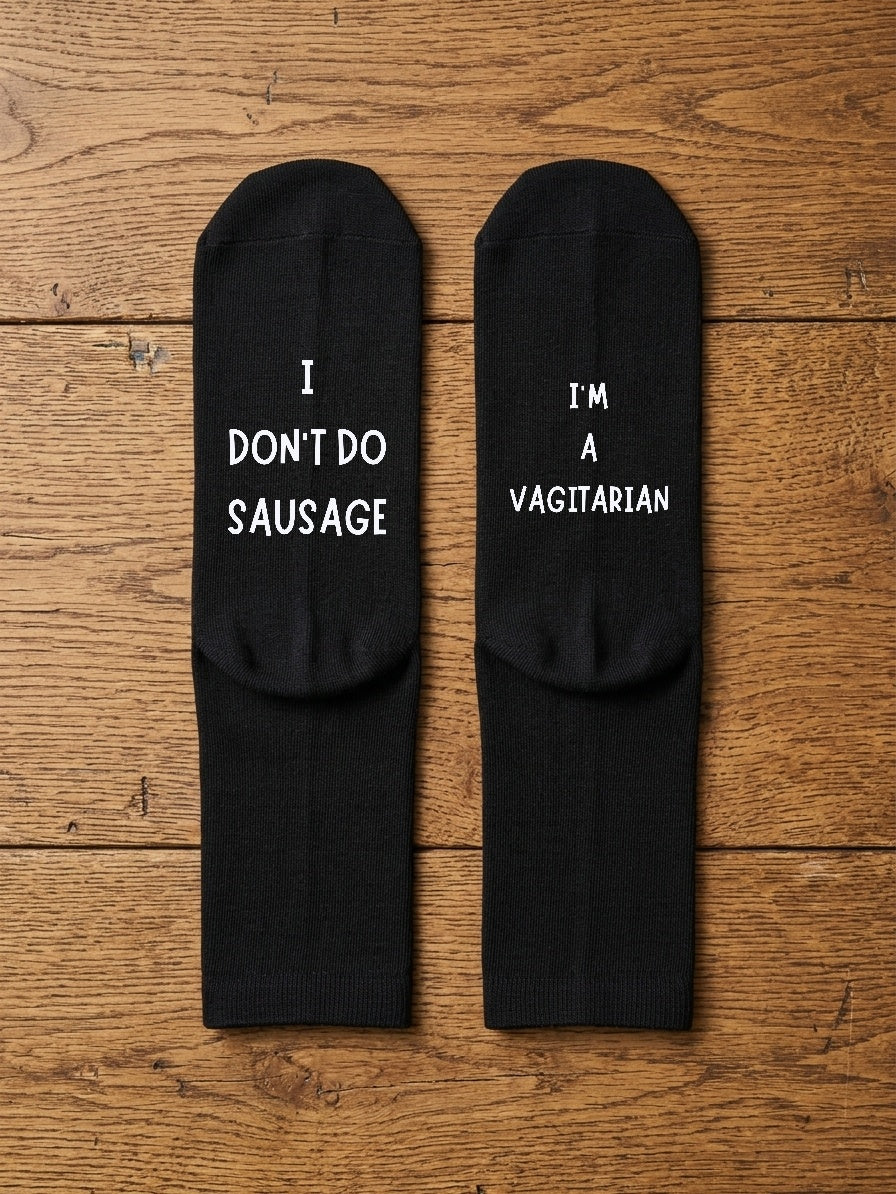 I don't do sausage, I'm a vagitarian black socks — flat-lay view