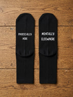 Physically Here Mentally Elsewhere Socks – Funny Gift – flat lay