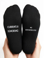 Currently Ignoring My Responsibilities Socks – Funny Gift – close-up of the wording
