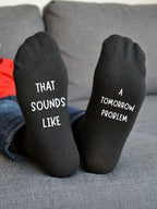 That Sounds Like a Tomorrow Problem Socks – Funny Gift — sofa view