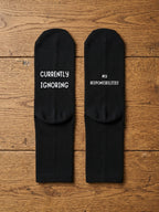 Currently Ignoring My Responsibilities Socks – Funny Gift — flat-lay view