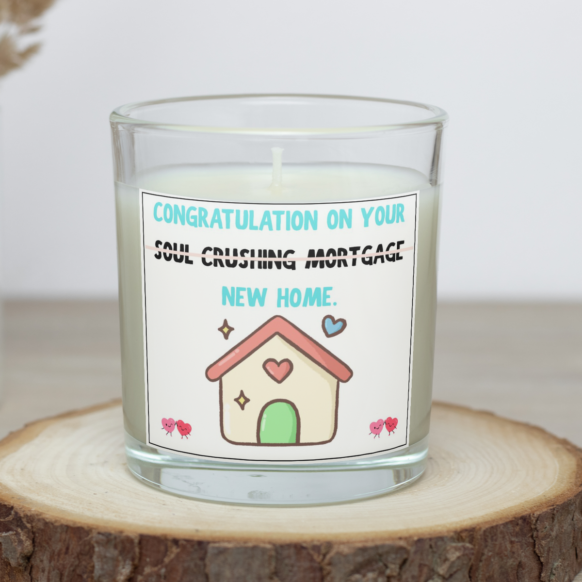 Funny new home candle with crossed-out soul crushing mortgage message