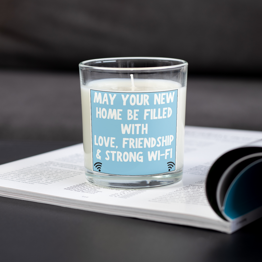 Love friendship and strong Wi-Fi housewarming candle on an open magazine