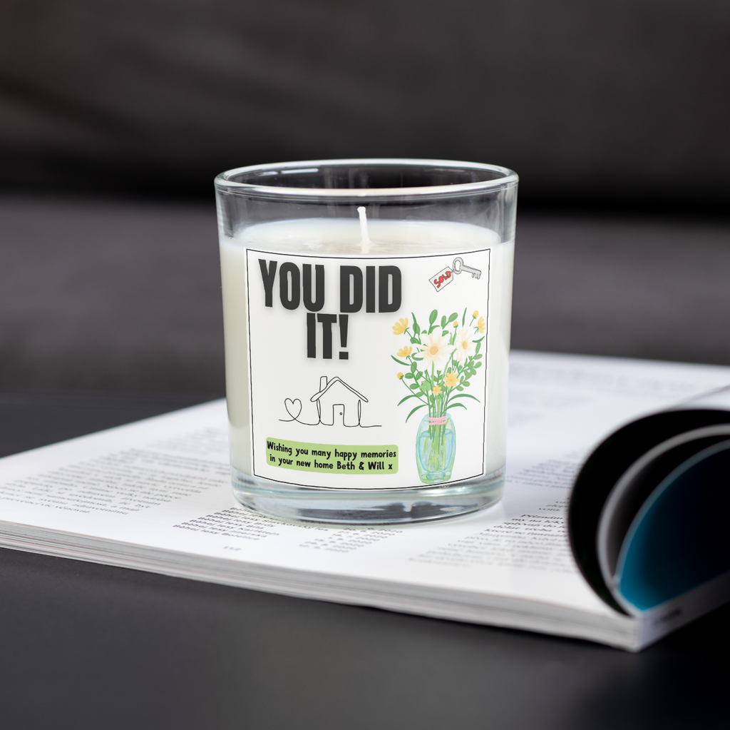 You Did It personalised new home candle on an open magazine